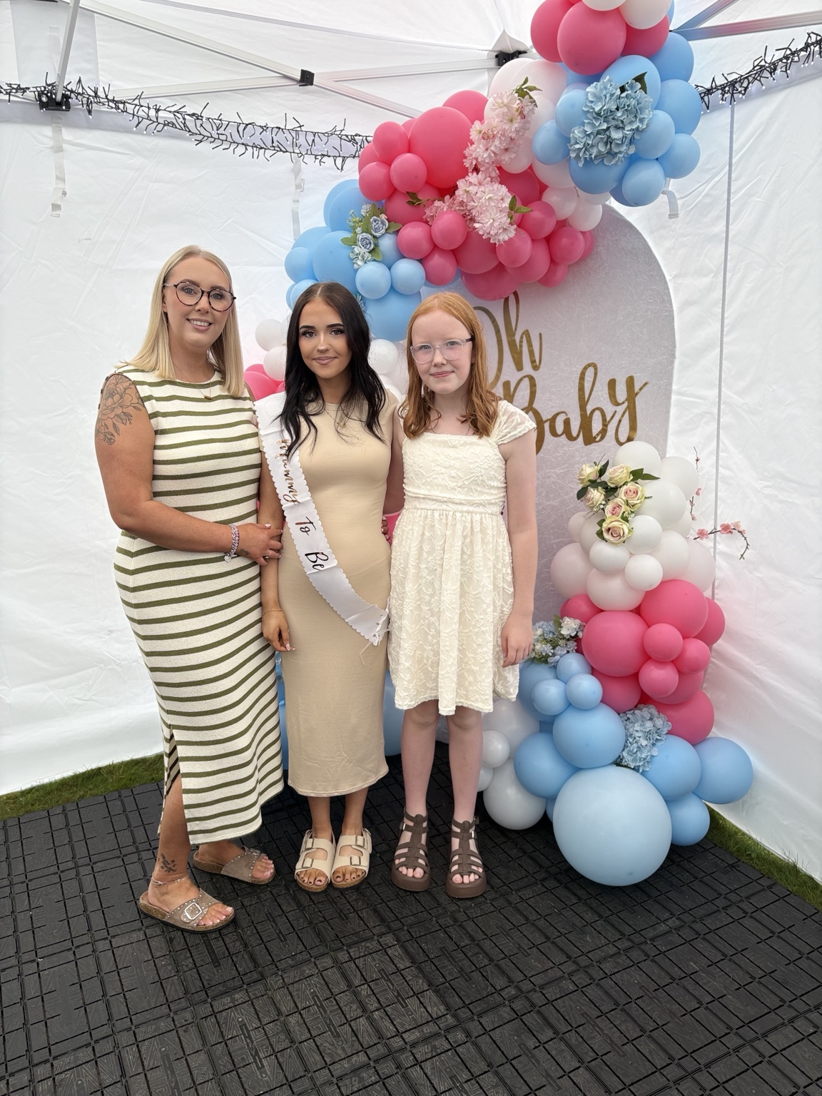 Rebecca with her daughters at a family celebration